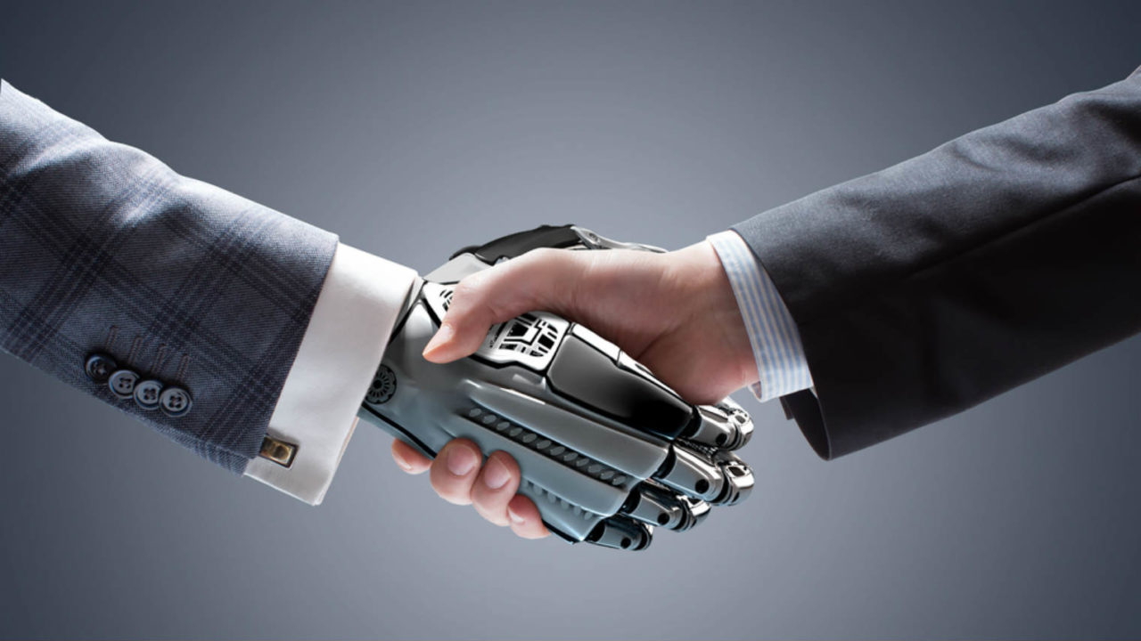 Man-shaking-hands-with-robot-1280×720